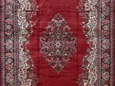 an oversize plain field arak rug